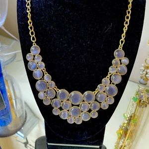 Beautiful bright gray/gold necklace.
